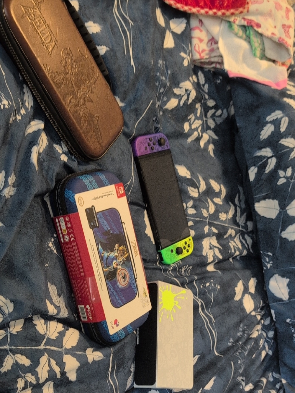 Nintendo Switch with Purple and Green Joy-Con Controllers